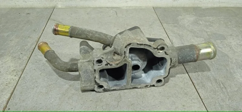Корпус термостата NISSAN PRIMERA 2001-2008 130499F600 P12