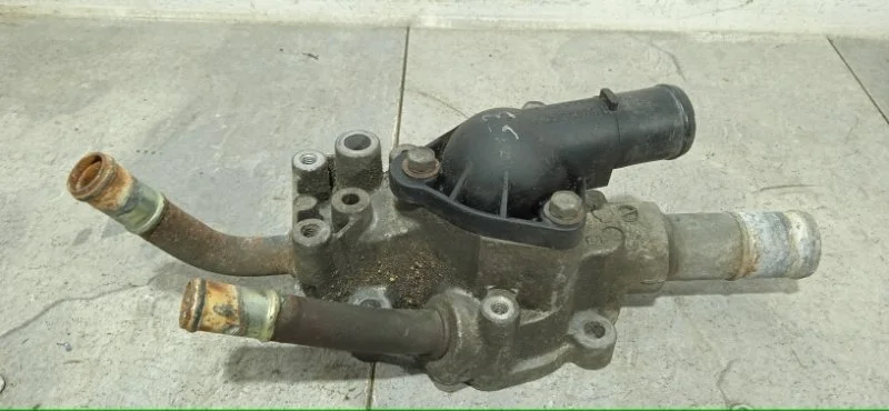 Корпус термостата NISSAN PRIMERA 2001-2008 130499F600 P12