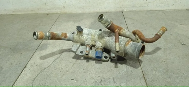 Корпус термостата NISSAN X-TRAIL 2007-2015 11060JH10A T31