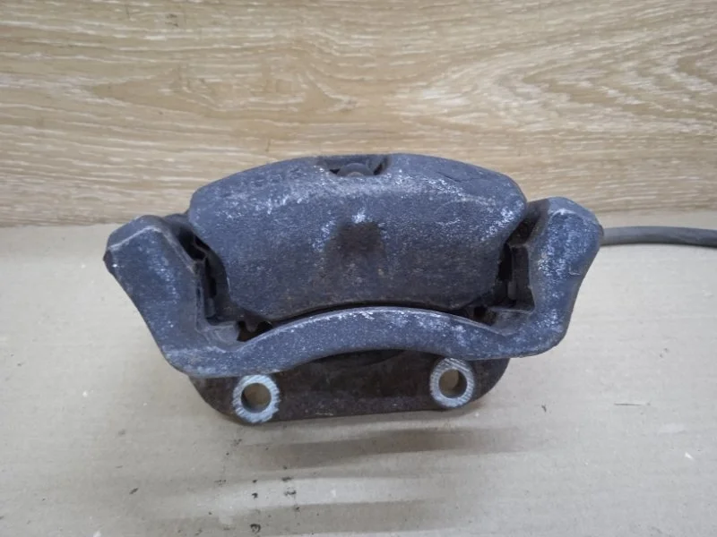 Суппорт тормозной RENAULT LOGAN 2012 410118579R СЕДАН K7M F 710, передний левый