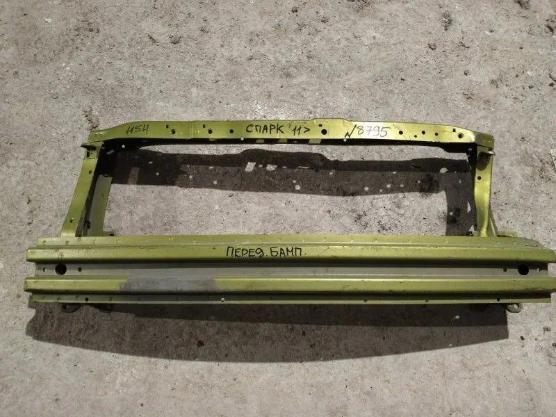 Усилитель бампера передний Chevrolet Spark 2011>