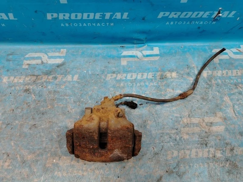 Суппорт тормозной передний левый Volkswagen Golf