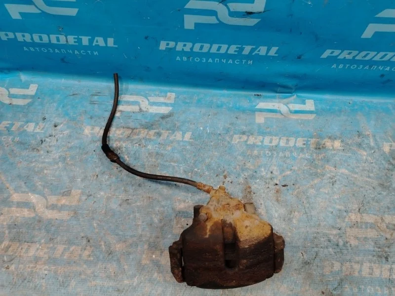 Суппорт тормозной передний правый Volkswagen Golf