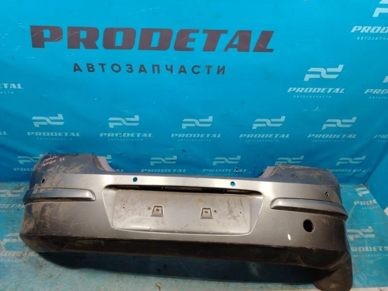 Бампер задний Opel Astra H 2006-2014