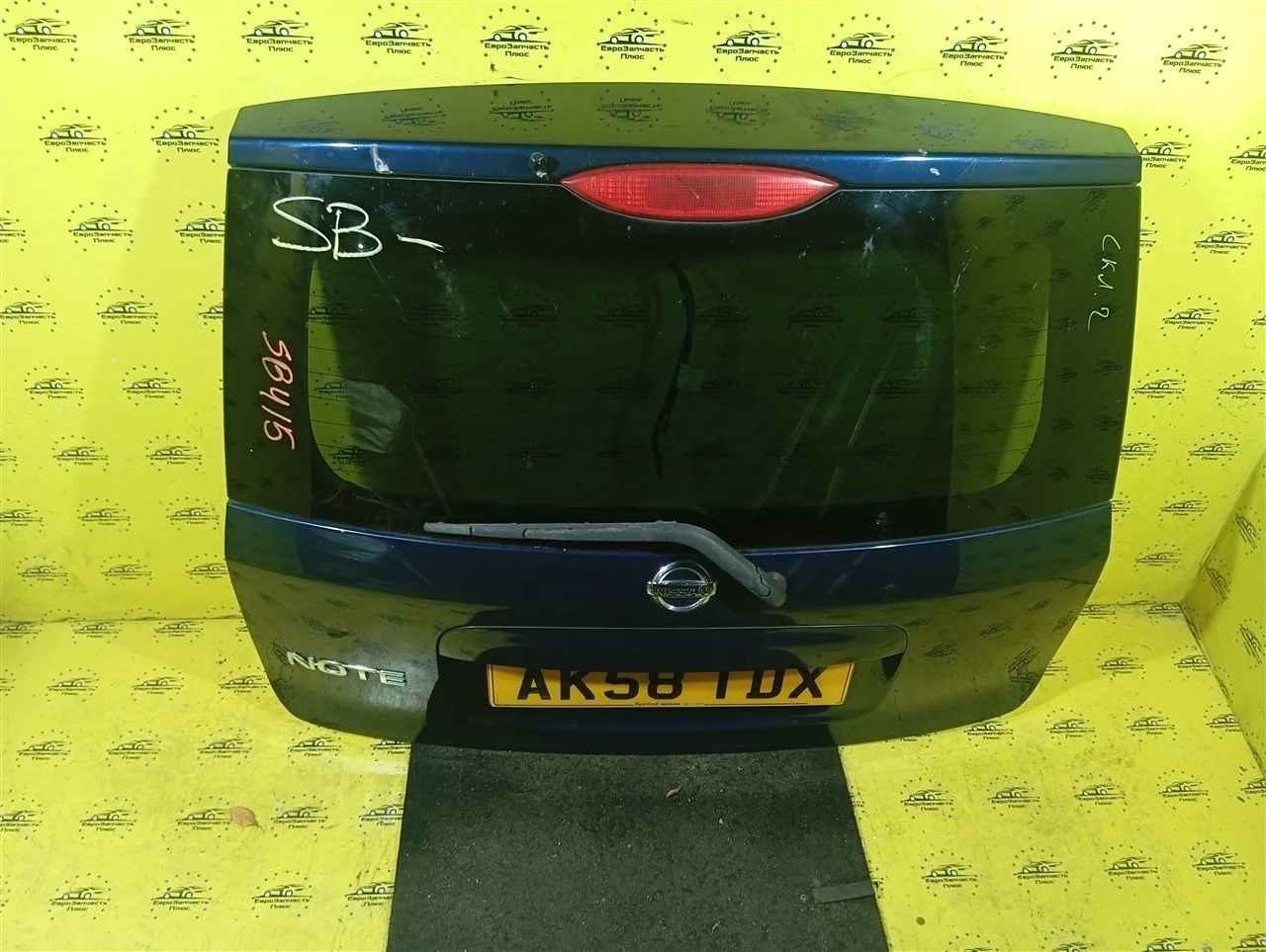 Крышка багажника Nissan Note K01009U0M0 E11