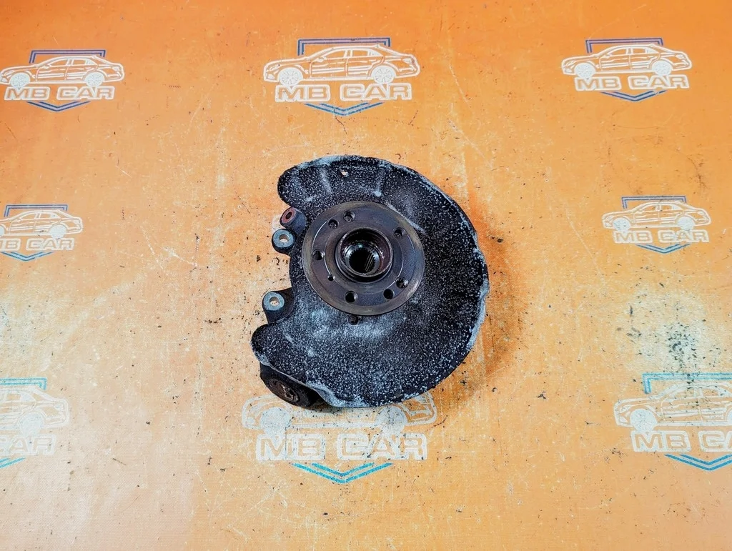 Кулак подвески задний левый Mercedes-Benz