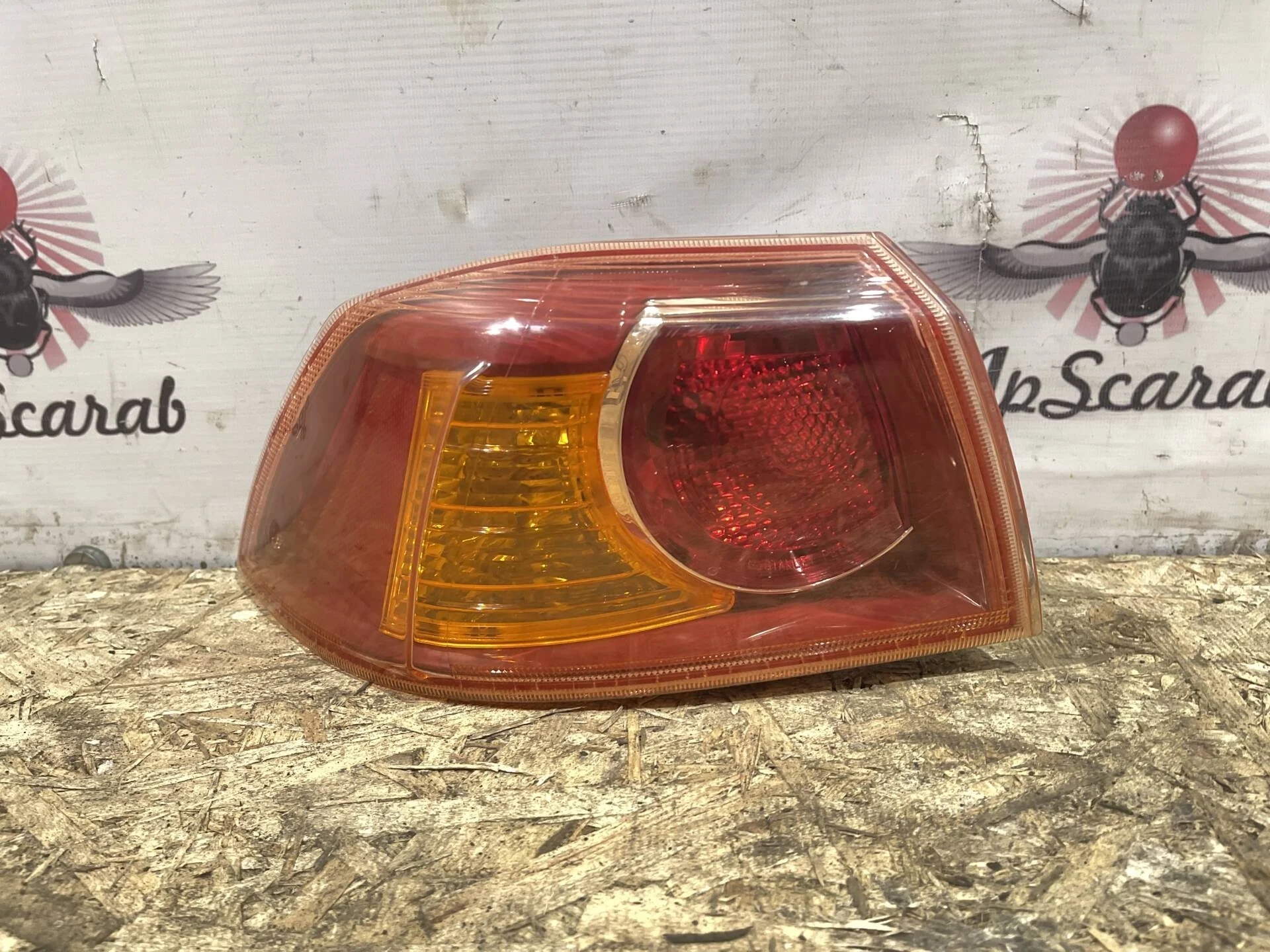 Фонарь задний левый Mitsubishi Lancer 10 CY