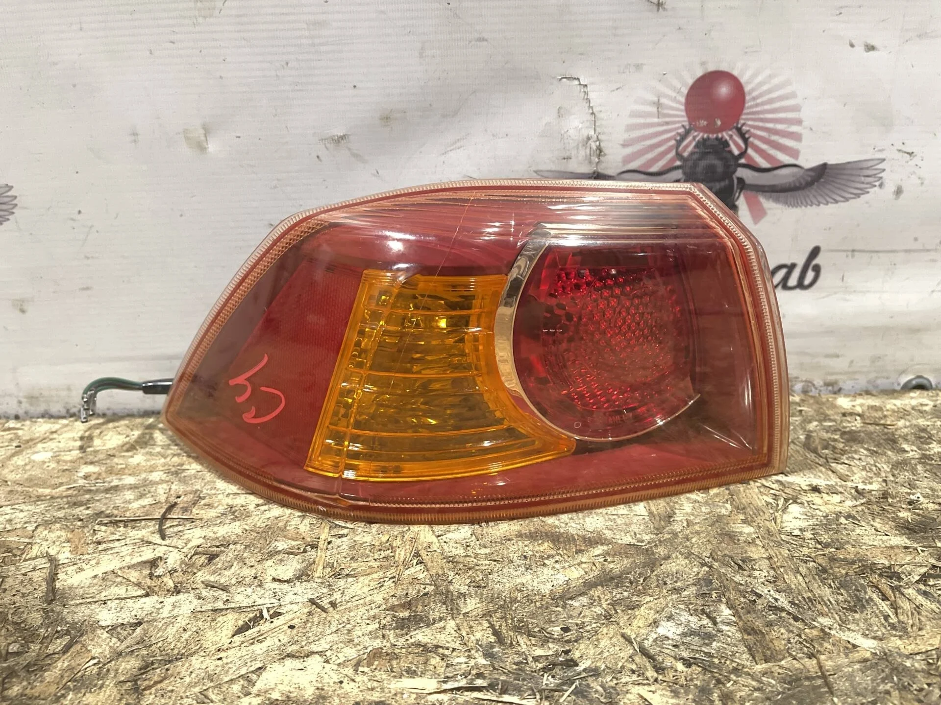 Фонарь задний левый Mitsubishi Lancer 10 CY