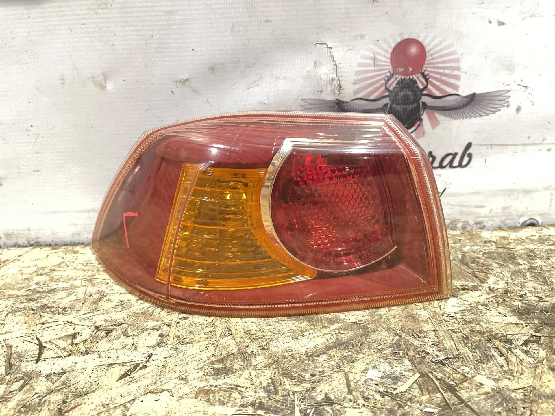 Фонарь задний левый Mitsubishi Lancer 10 CY