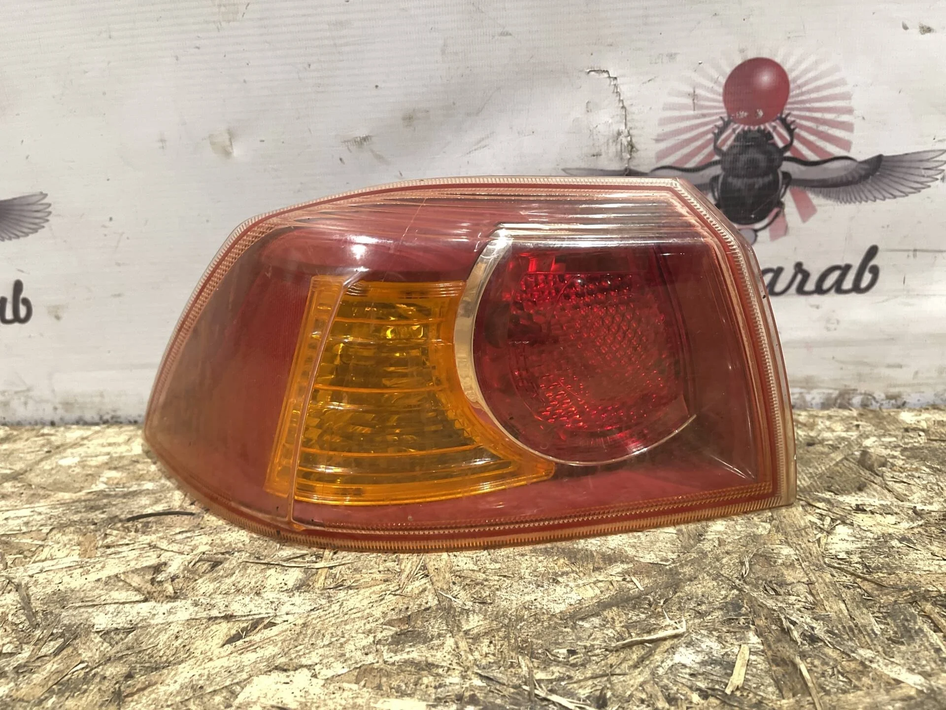 Фонарь задний левый Mitsubishi Lancer 10 CY