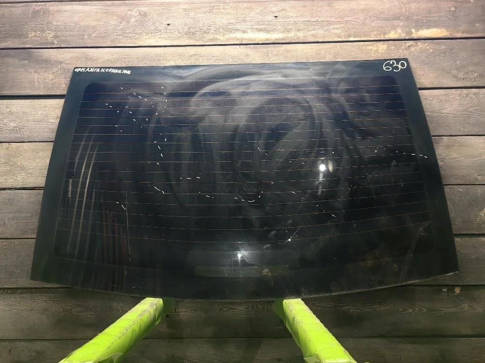 Стекло заднее Opel Astra H