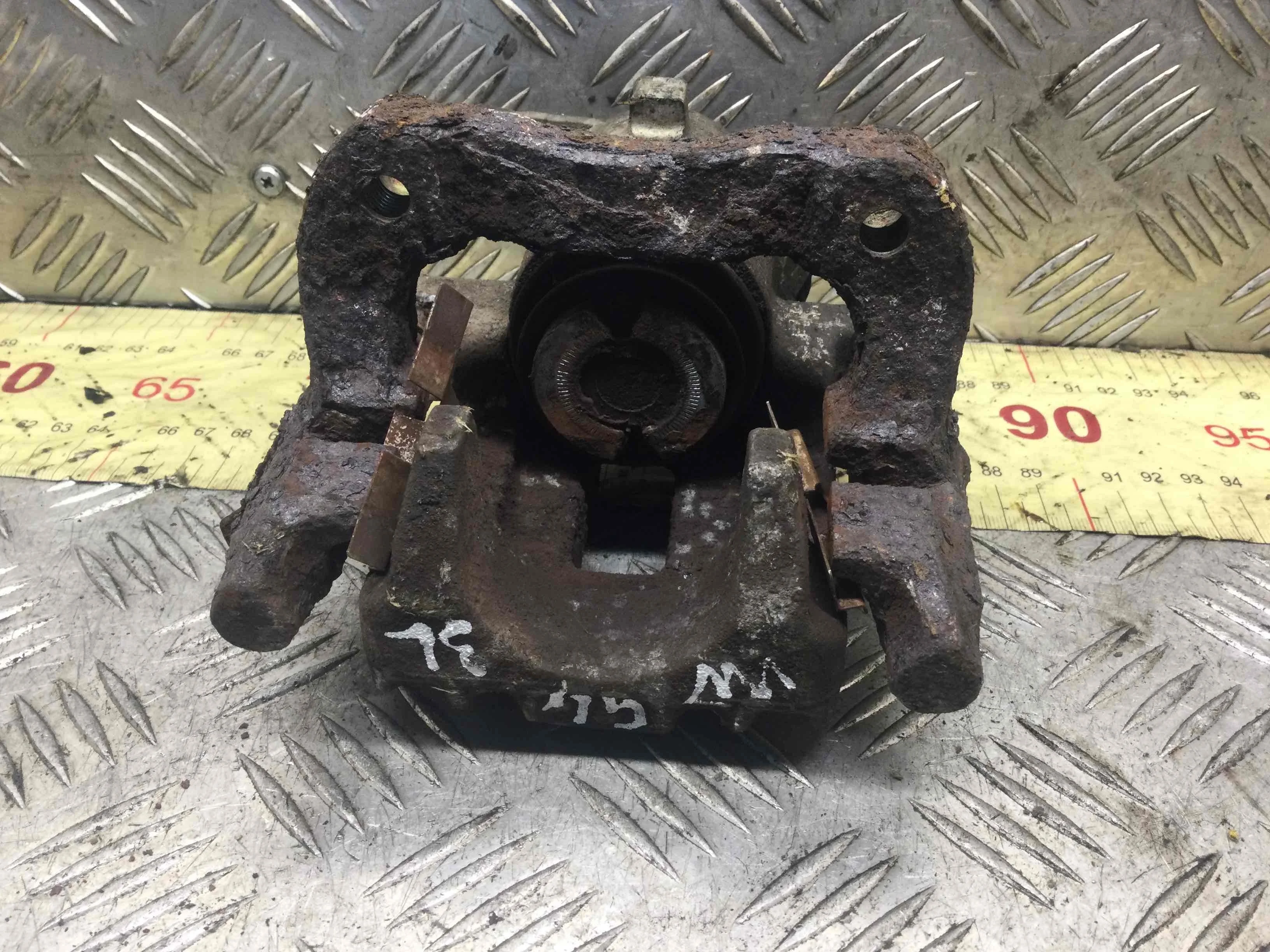 Суппорт задний левый Volkswagen Golf 4 поколение (1997-2004) дизель 1.9 TDI Механика Х/б