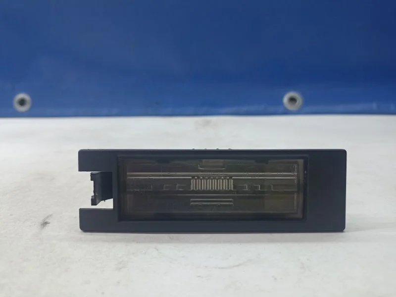 Фонарь подсветки номера Chevrolet Cobalt 13251936 T250