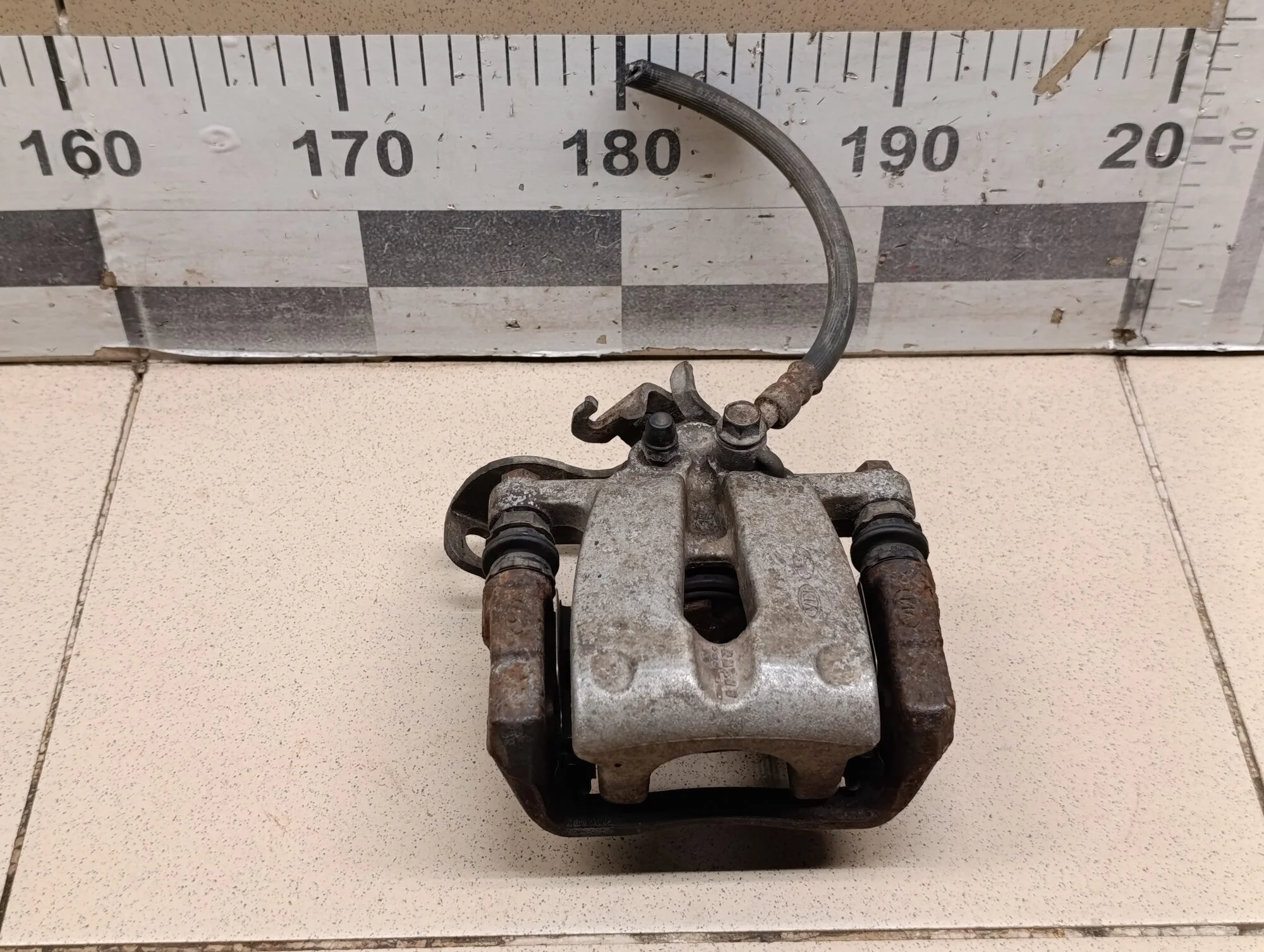 Суппорт задний левый Ceed 2012>