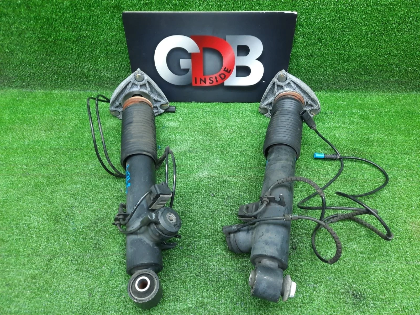 Стойка амортизатора BMW X5 10.07.2015 37106875087 F15 N57D30A, задняя