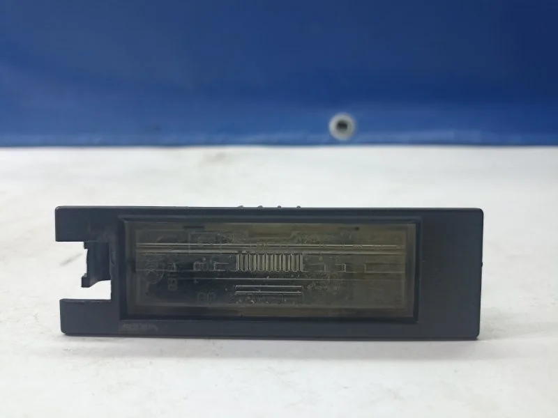 Фонарь подсветки номера Chevrolet Cobalt 2010-2021 13251936 T250