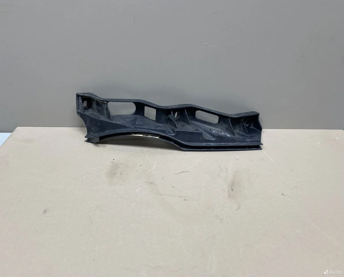 Кронштейн левой фары vw passat b6