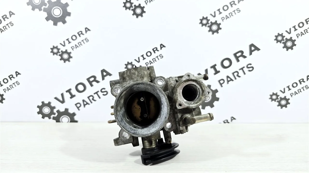 Дроссельная заслонка пробег 70к Mitsubishi Lancer 9 2007 MN128888 CS3W 4G18