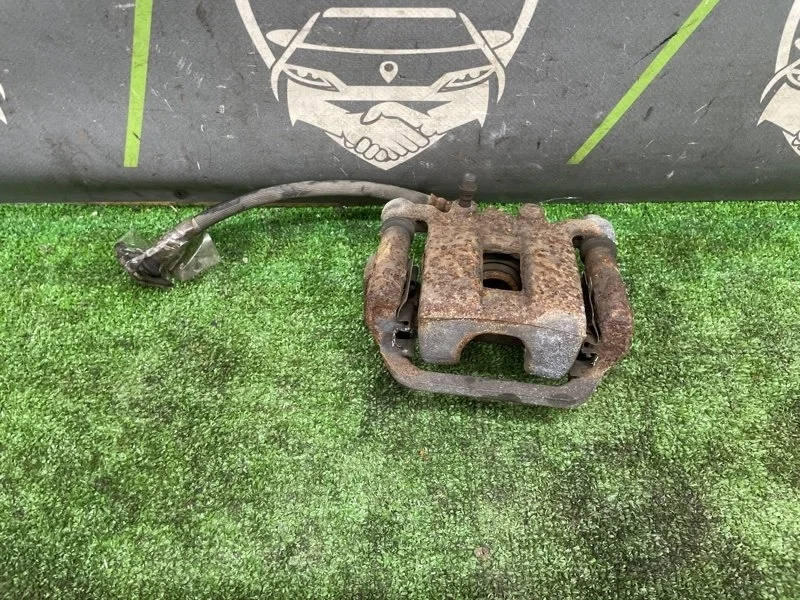 Суппорт тормозной Nissan X-Trail 2012 44011JG00A NT31 MR20DE, задний левый