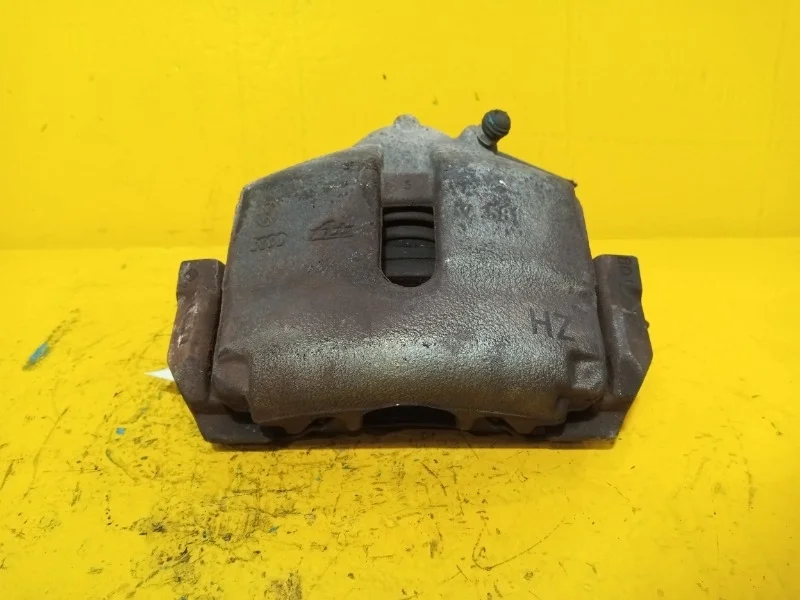 Суппорт тормозной Volkswagen Touran 2008-2016