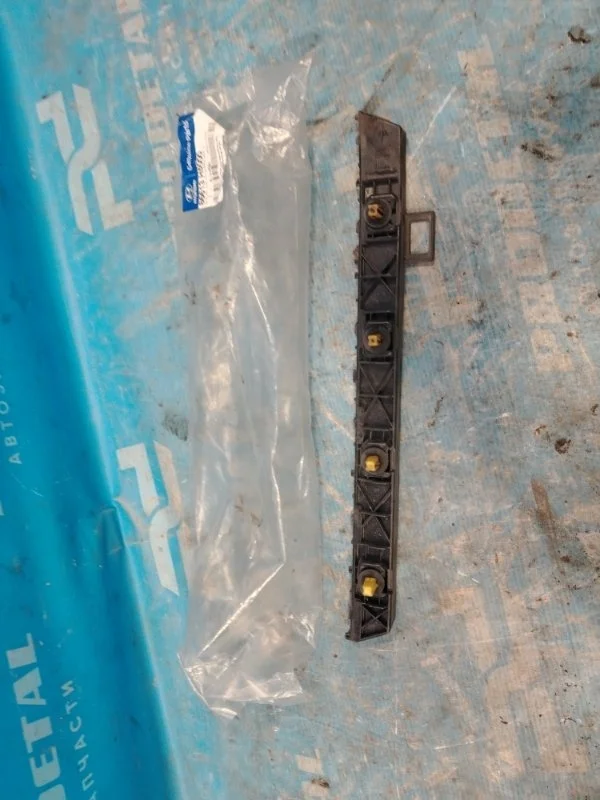 Кронштейн бампера задний левый Hyundai Solaris