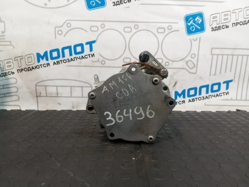 Насос вакуумный Skoda Octavia 06J145100B A5