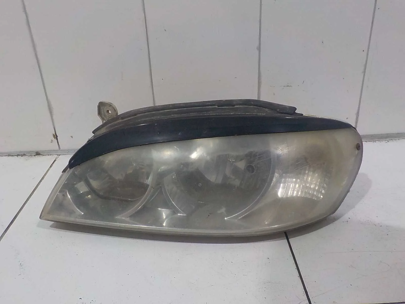 Фара Kia Spectra I рестайлинг 2 (2004—2011)  Лево