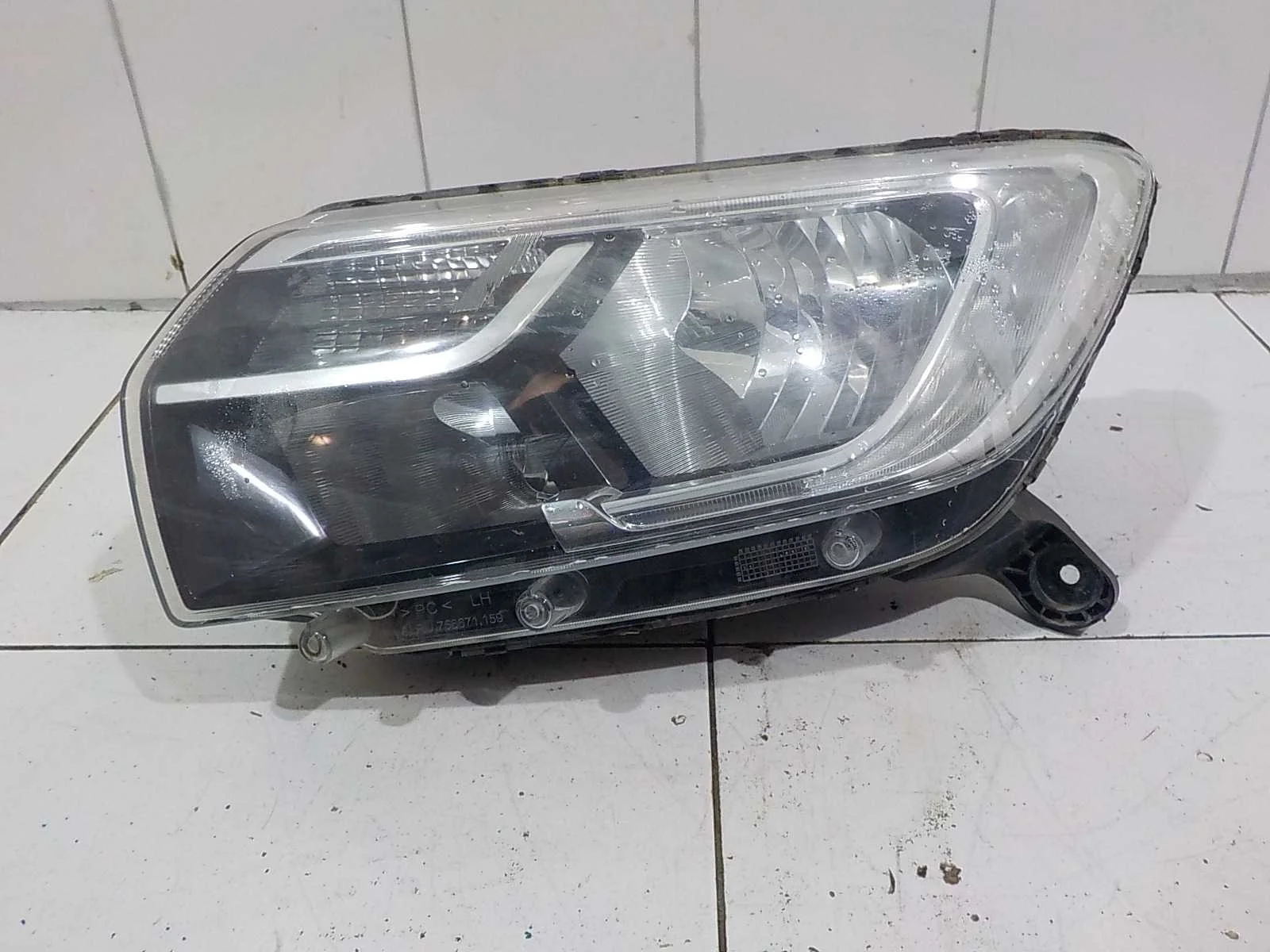Фара Renault Logan II (2012—2018)  Лево