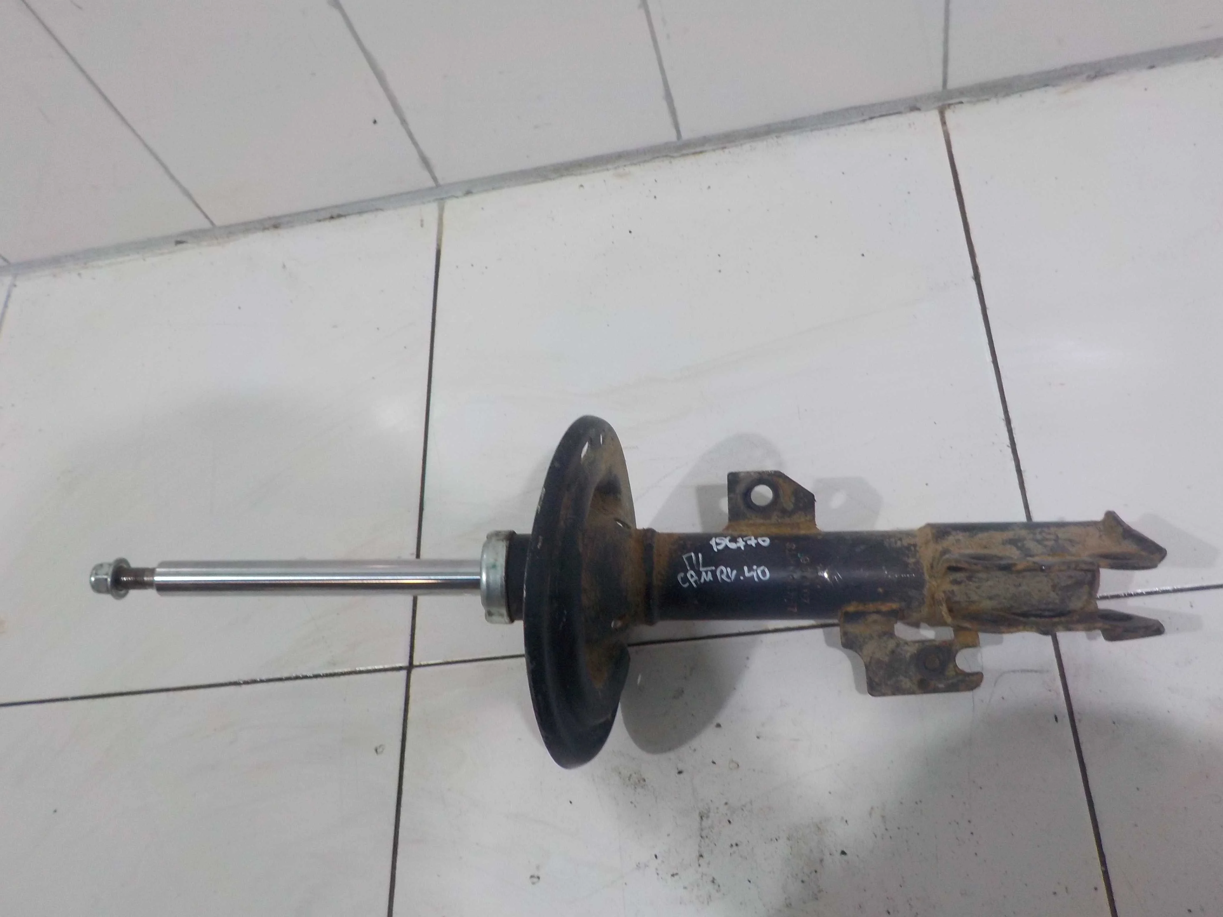 амортизатор Toyota Camry XV40 (2006—2009) Перед Лево