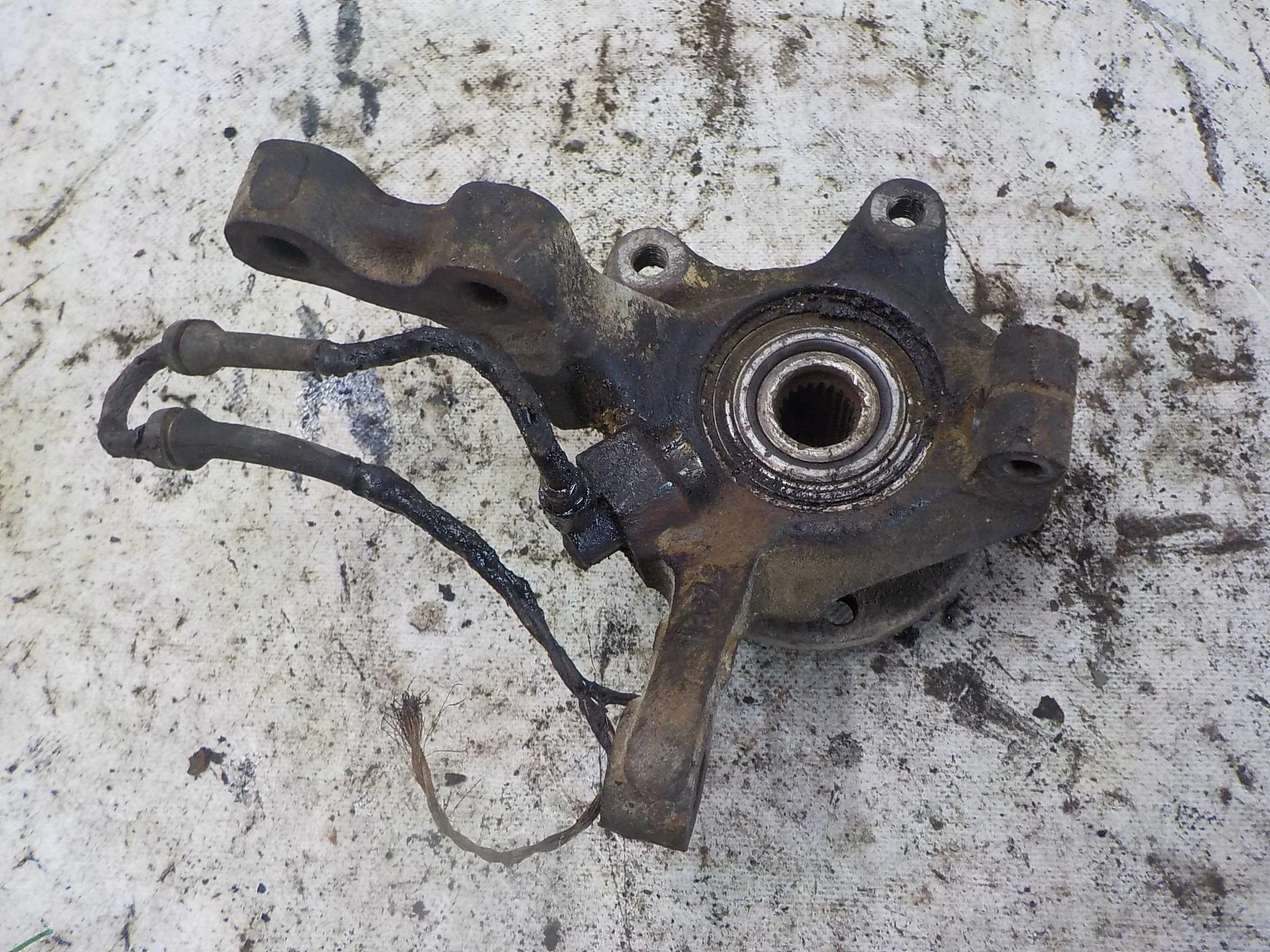 кулак поворотный Renault Kangoo I (1997—2003) Перед Лево