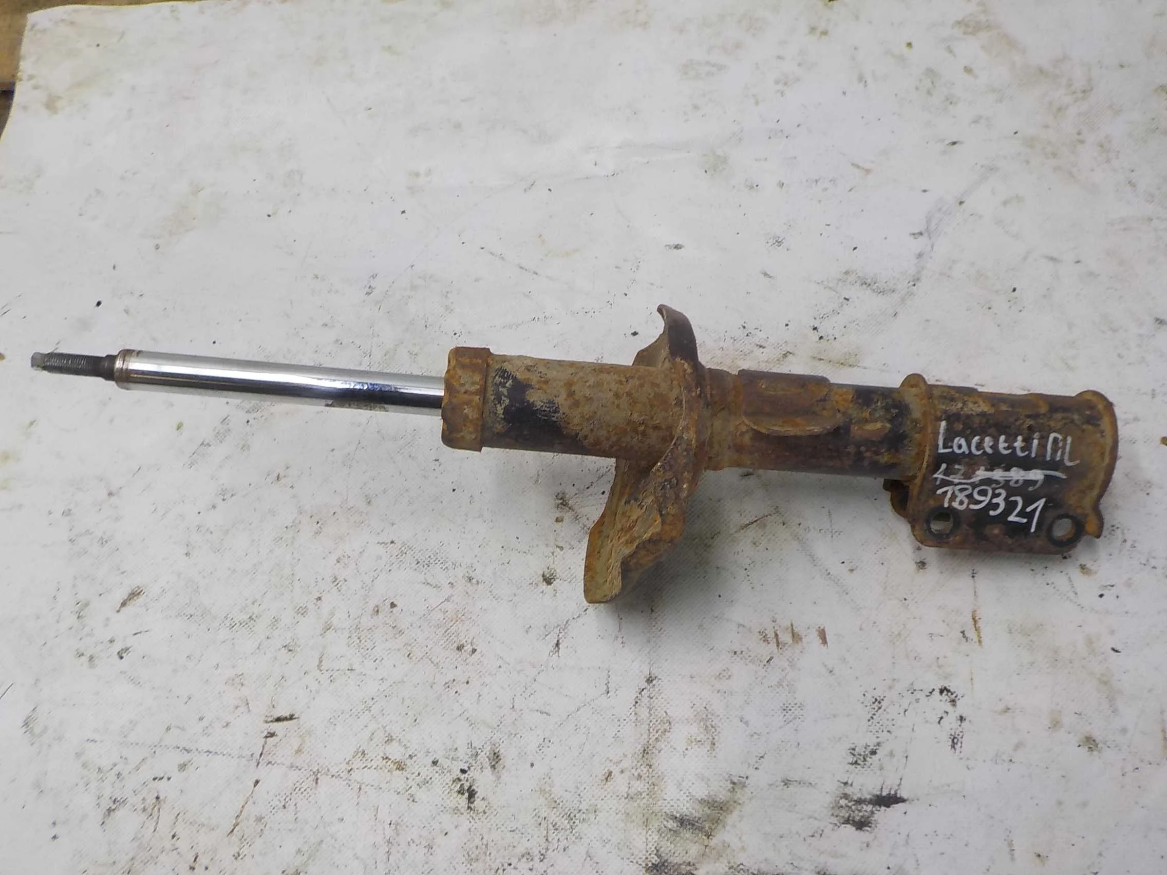 амортизатор Chevrolet Lacetti I (2004—2013) Перед Лево