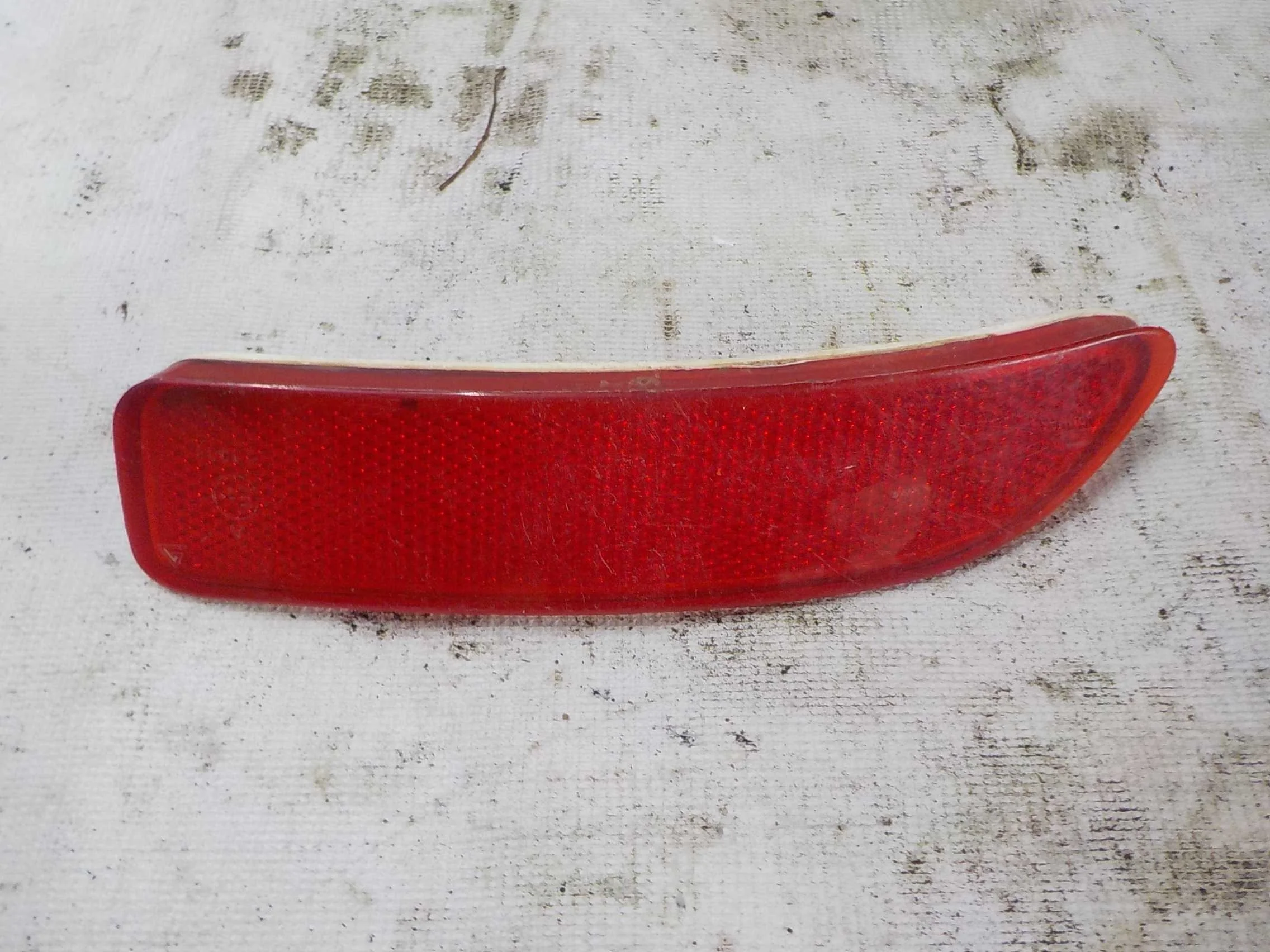 катафот Renault Logan I (2004—2009)  Лево