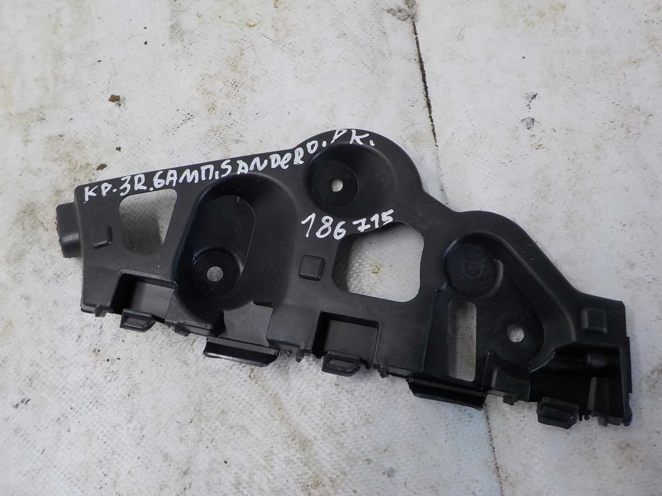 кронштейн бампера Renault Sandero I (2009—2014) Зад Право