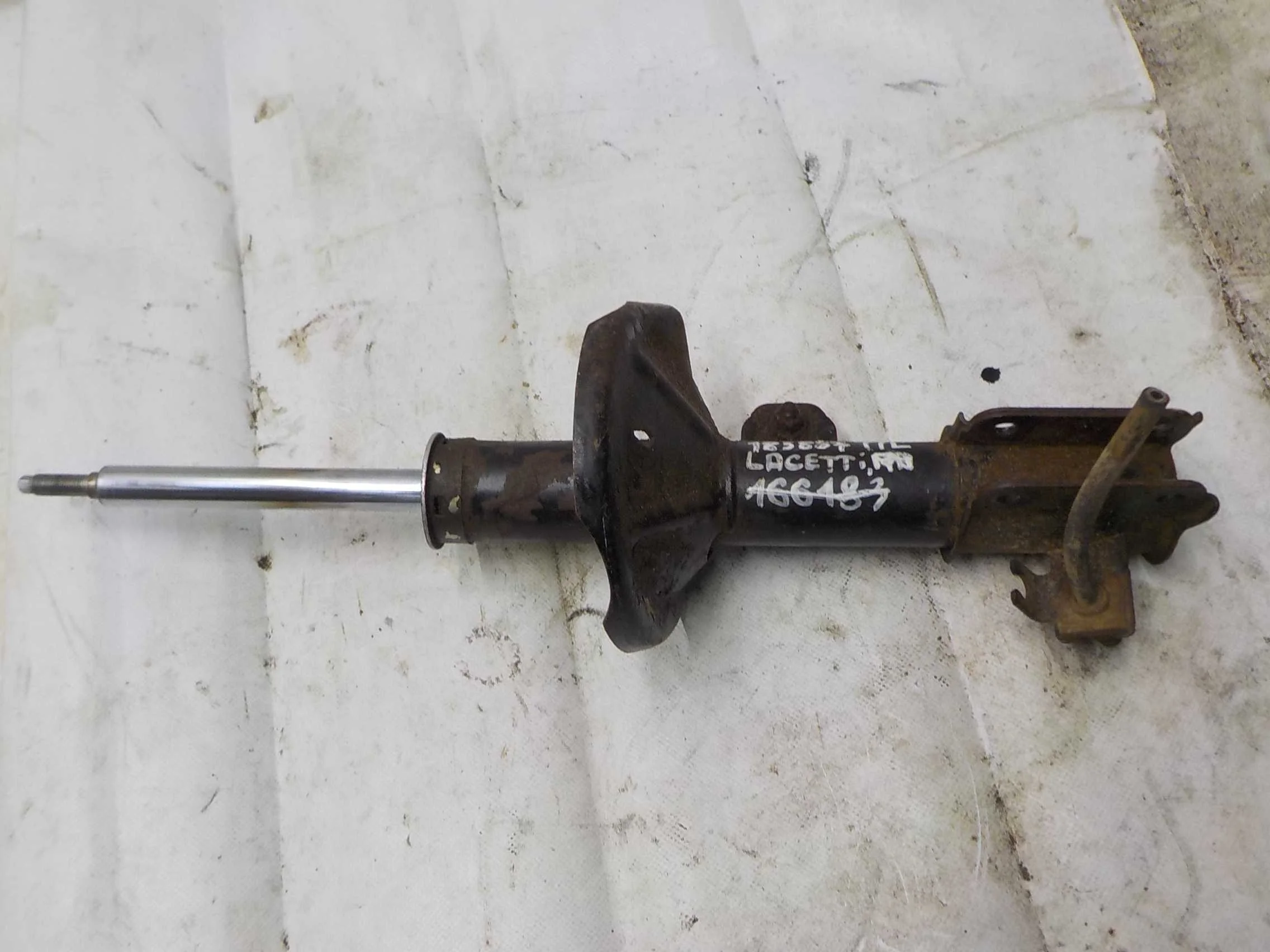 амортизатор Chevrolet Lacetti I (2004—2013) Перед Лево