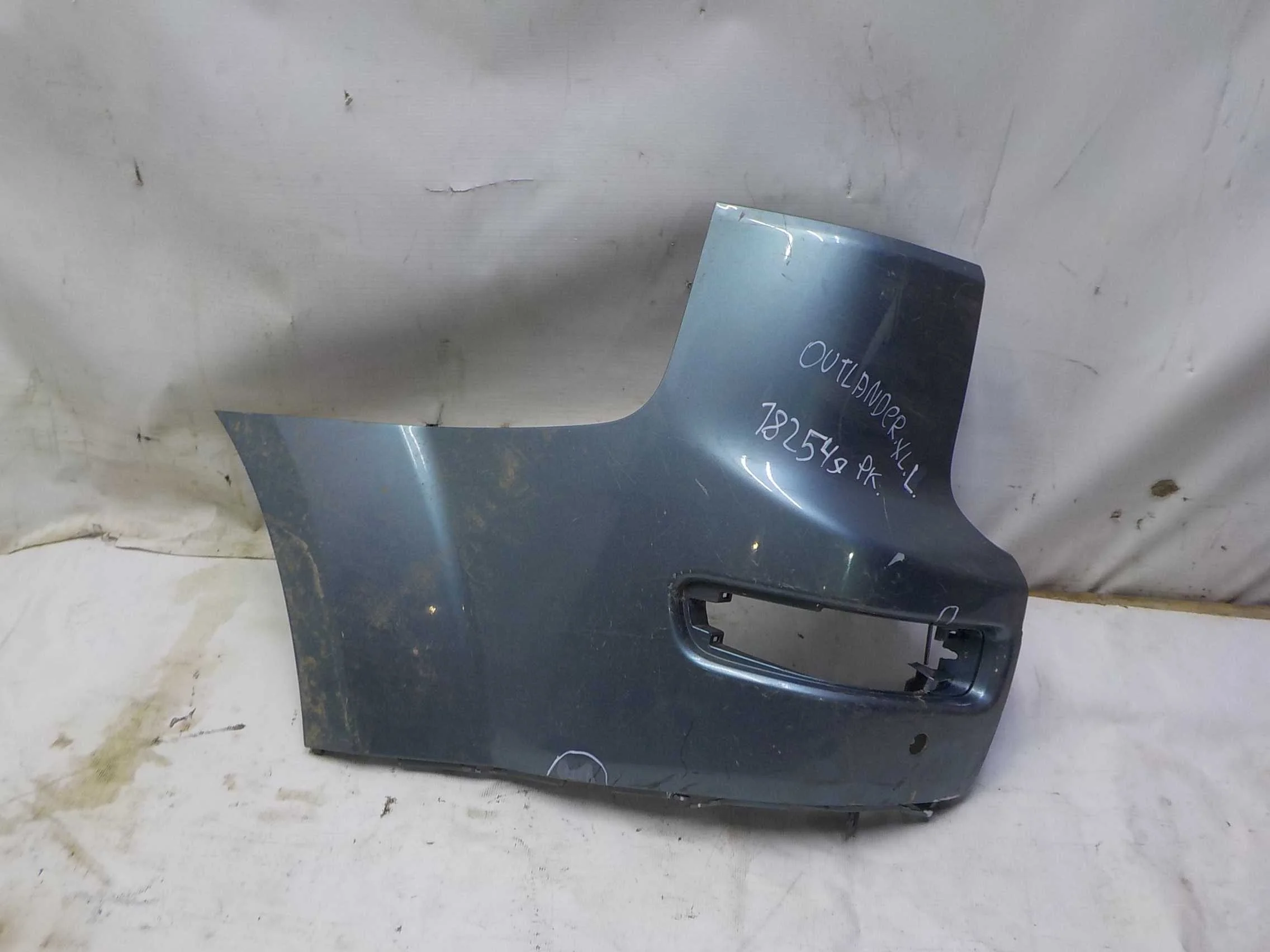 Бампер Mitsubishi Outlander II (2005—2009) Зад Лево