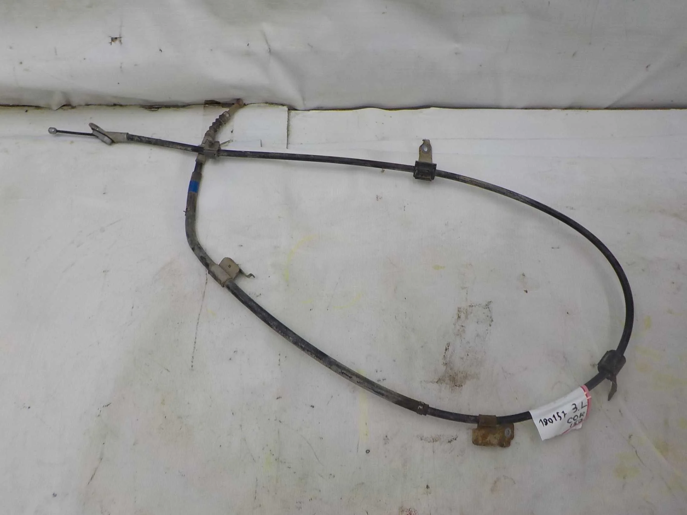 тросик ручника Toyota Corolla X (2006—2010)  Лево