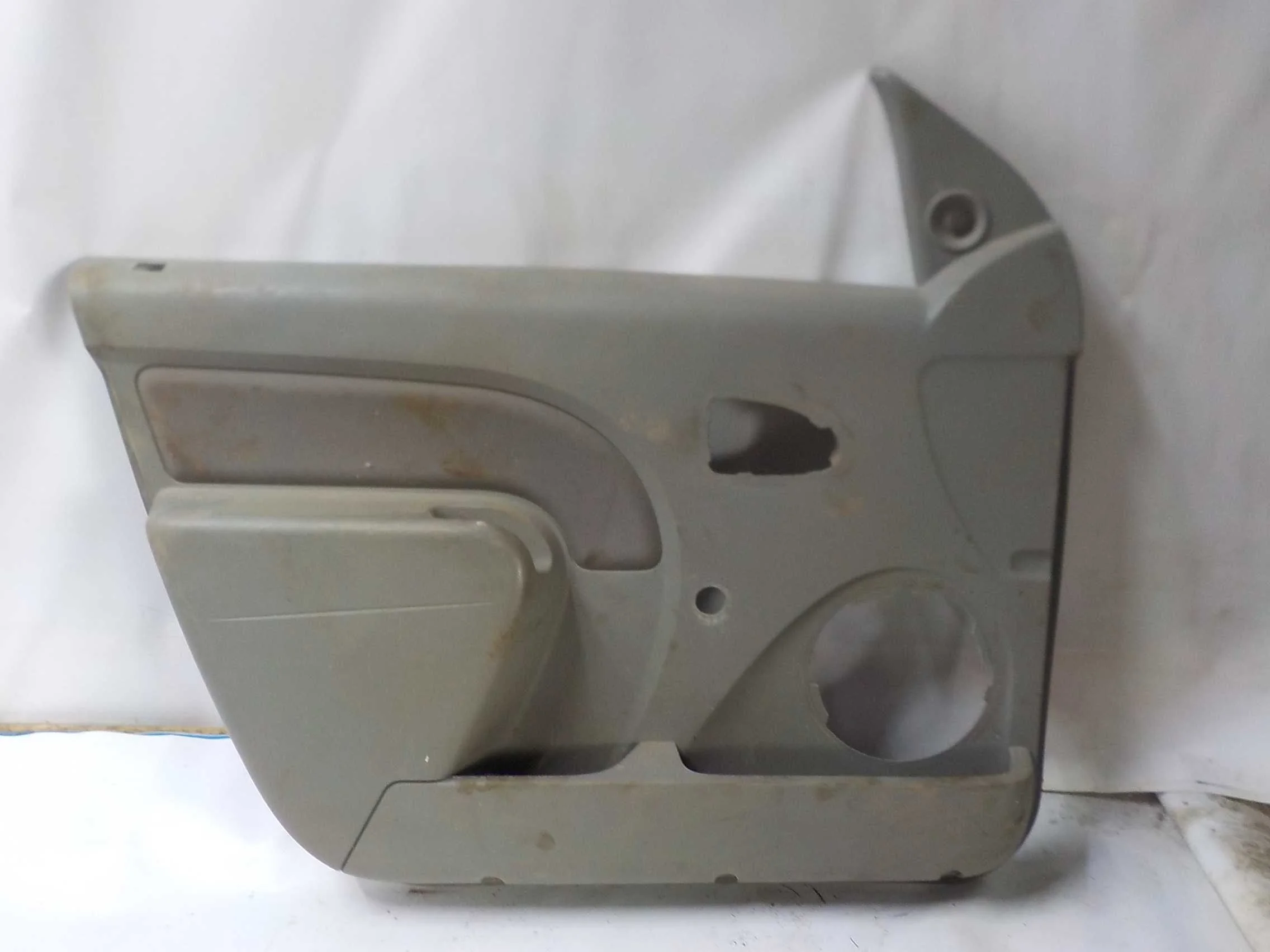 Обшивка двери Renault Logan I (2004—2009) Перед Лево