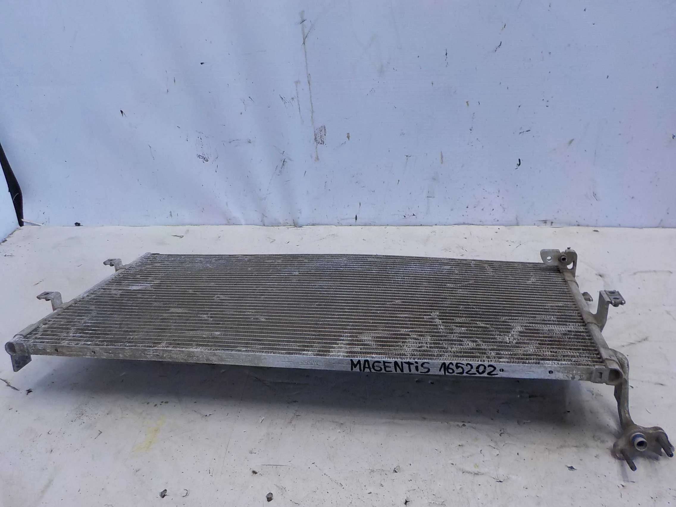 Радиатор кондиционера Kia Sedona II (2005—2010)