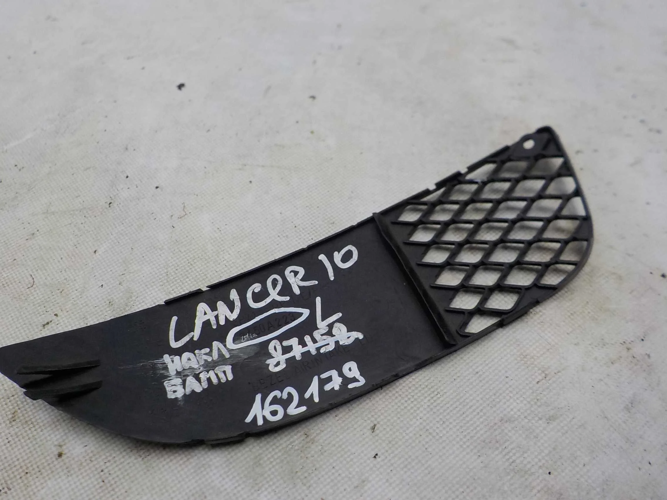 накладка на бампер Mitsubishi Lancer X рестайлинг (2011—2015) Перед Лево