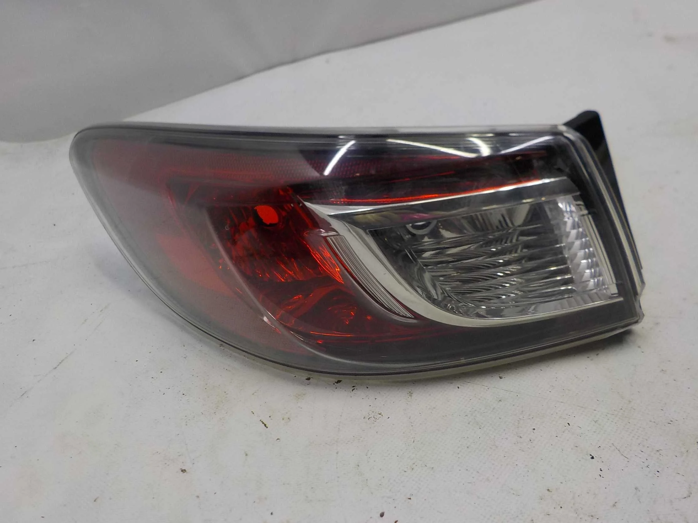 Фонарь Mazda 3 BL (2008—2011)  Лево