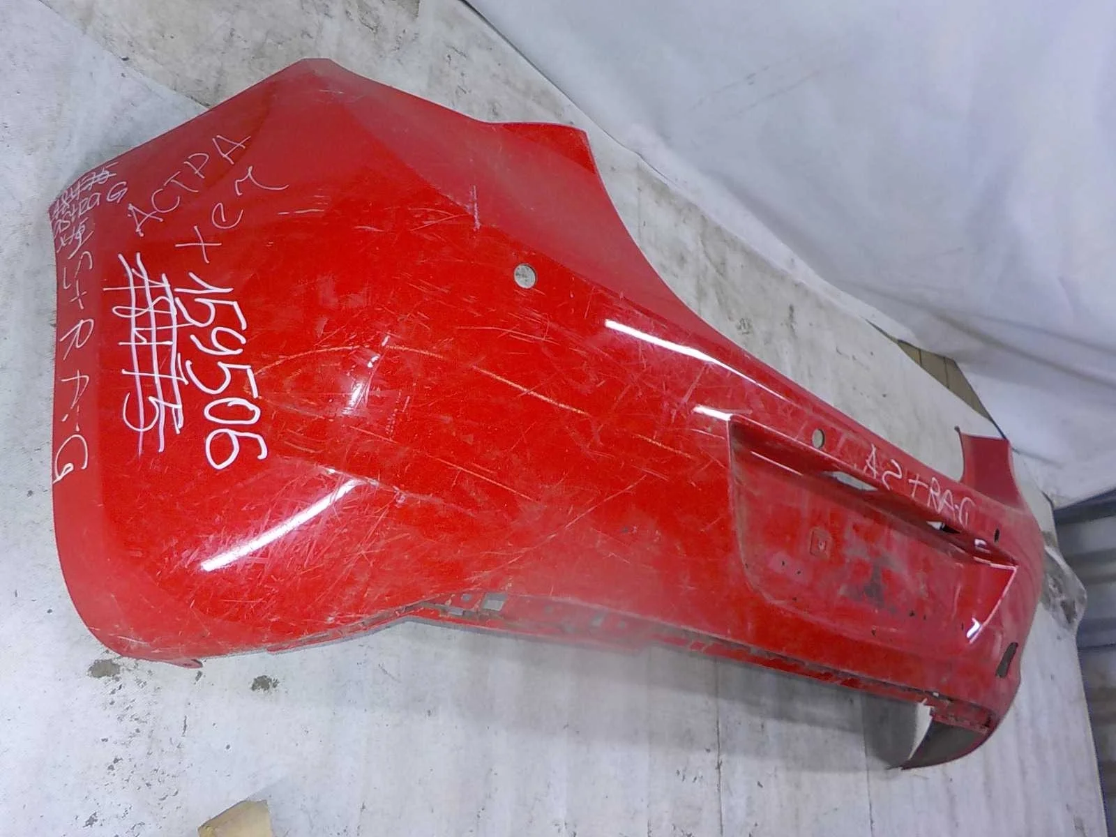 Бампер Opel Astra J (2009—2012) Зад