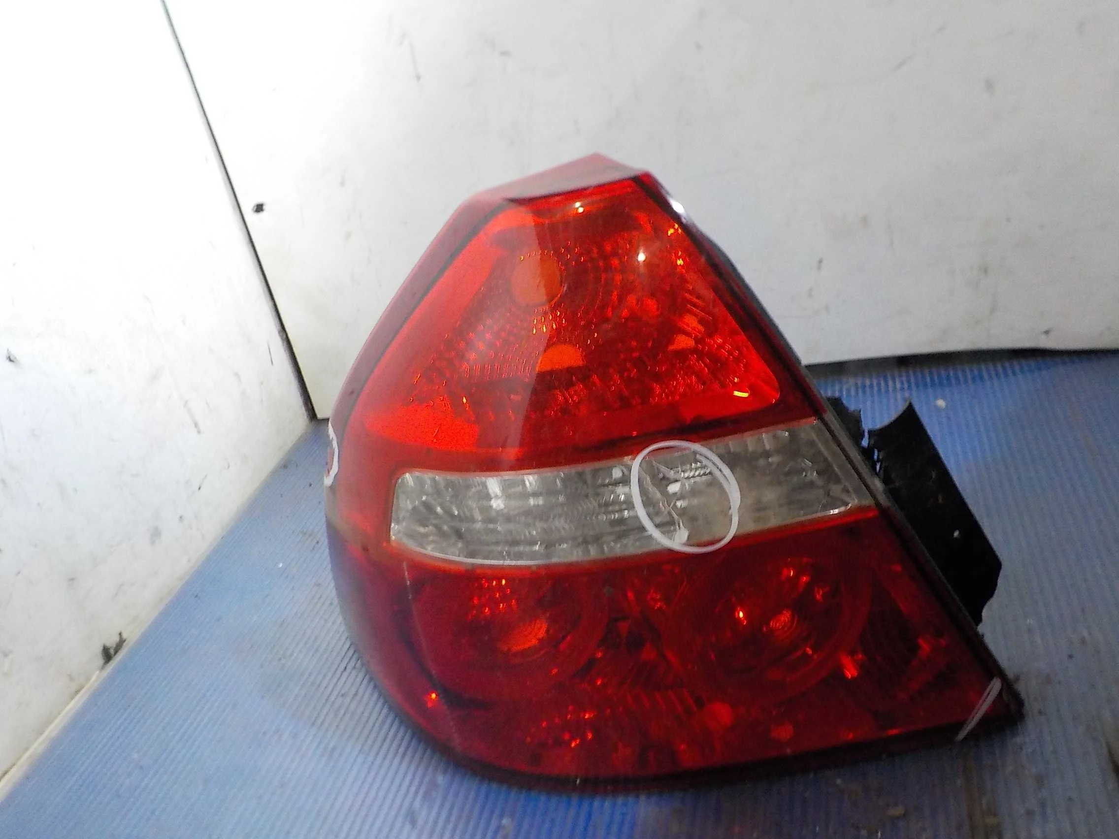 Фонарь Chevrolet Aveo I (2003—2008) Зад Лево