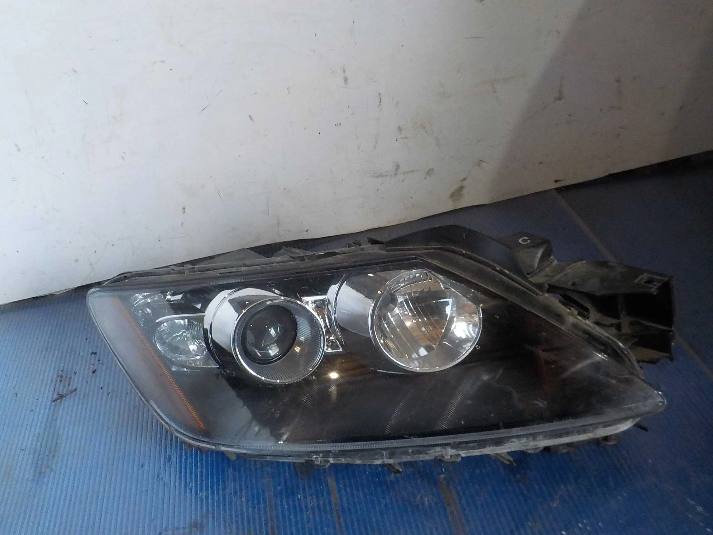 Фара Mazda CX-7 I (2006—2009)  Право