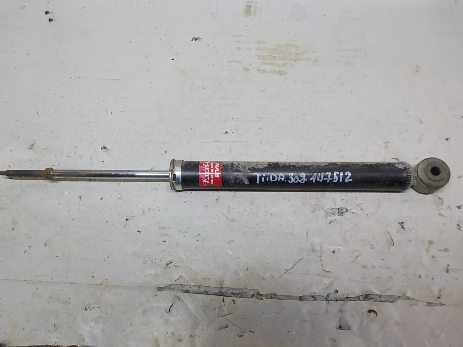 амортизатор Nissan Tiida C11 (2004—2012) Зад