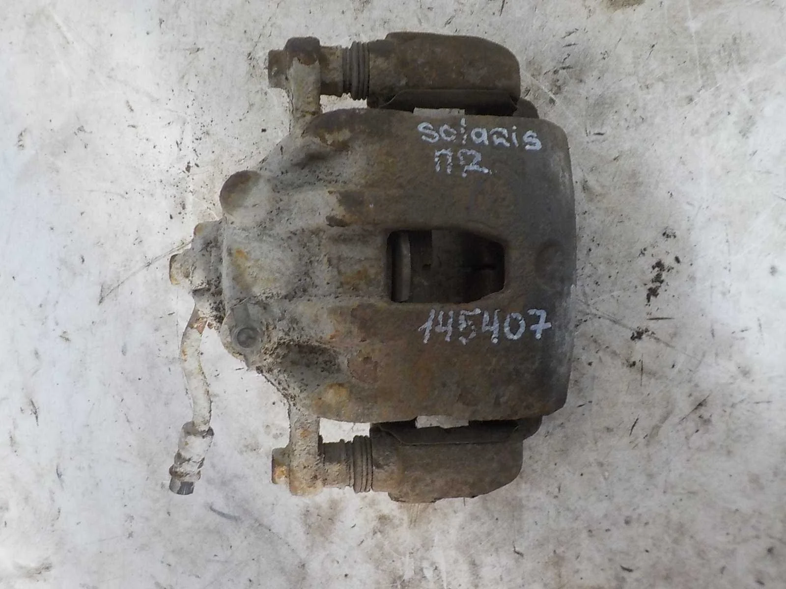 суппорт Hyundai Solaris I (2010—2014) Перед Право