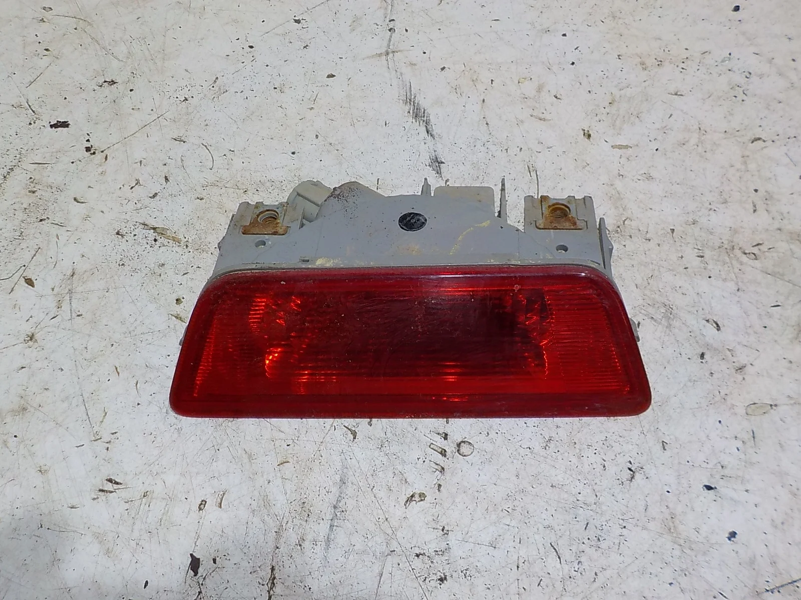 Фонарь задний противотуманный Nissan X-Trail II рестайлинг (2010—2015) Зад Лево