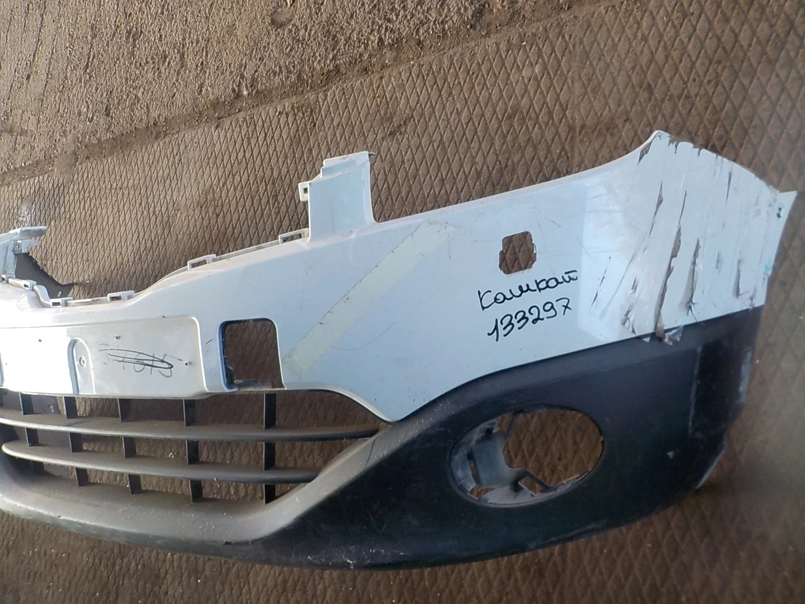 Бампер Nissan Qashqai+2 I рестайлинг (2010—2013)