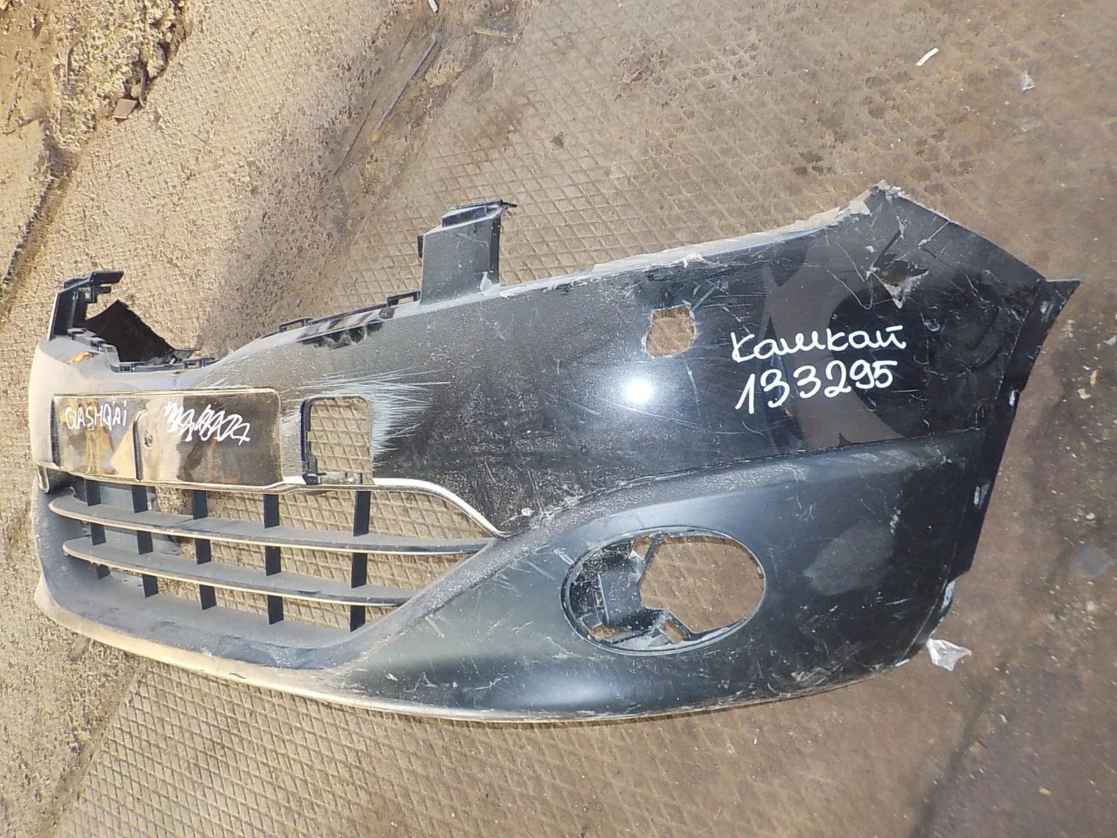 Бампер Nissan Qashqai+2 I рестайлинг (2010—2013)