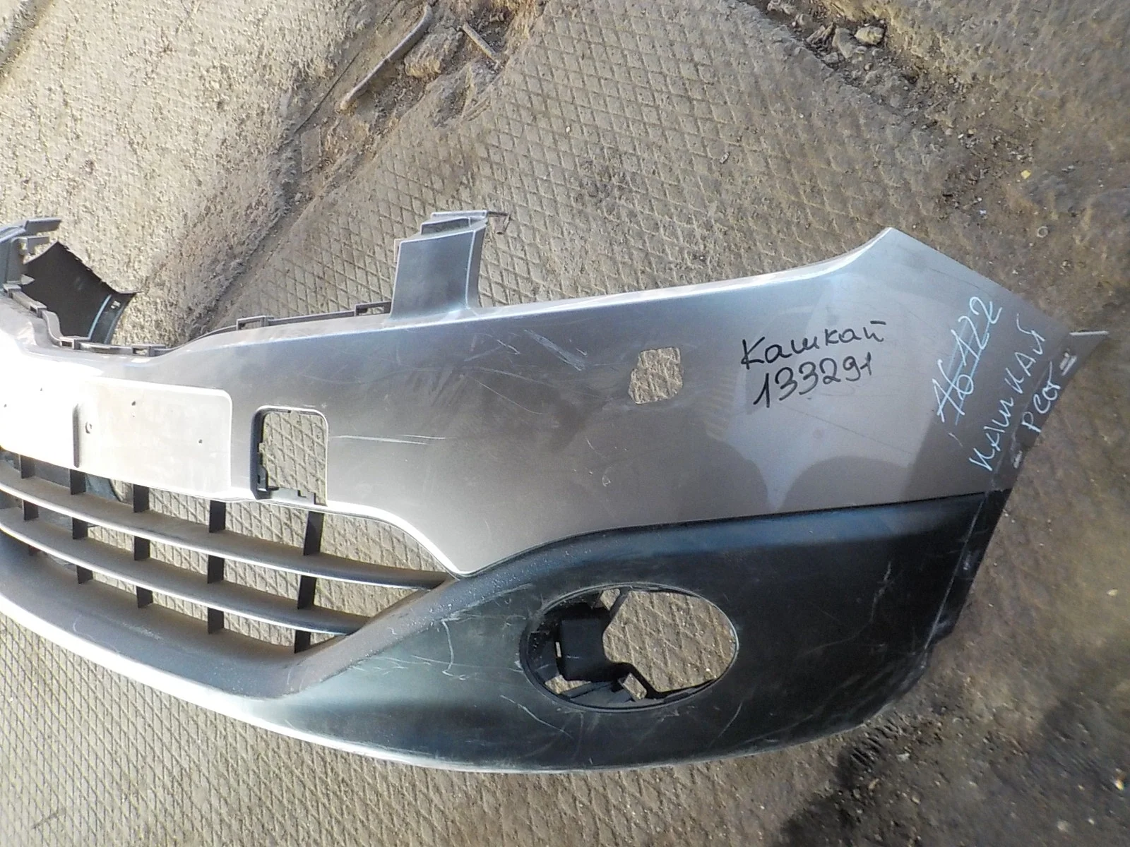 Бампер Nissan Qashqai+2 I рестайлинг (2010—2013)