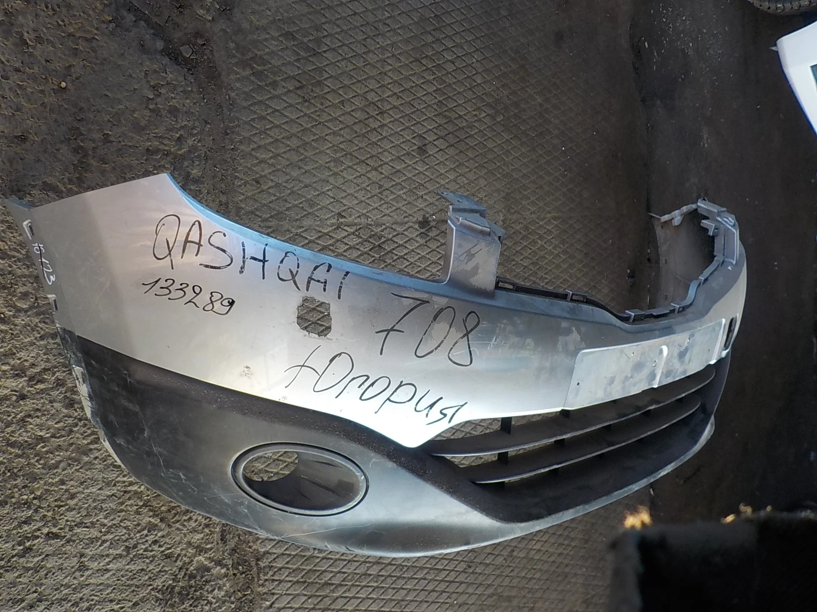 Бампер Nissan Qashqai+2 I рестайлинг (2010—2013)